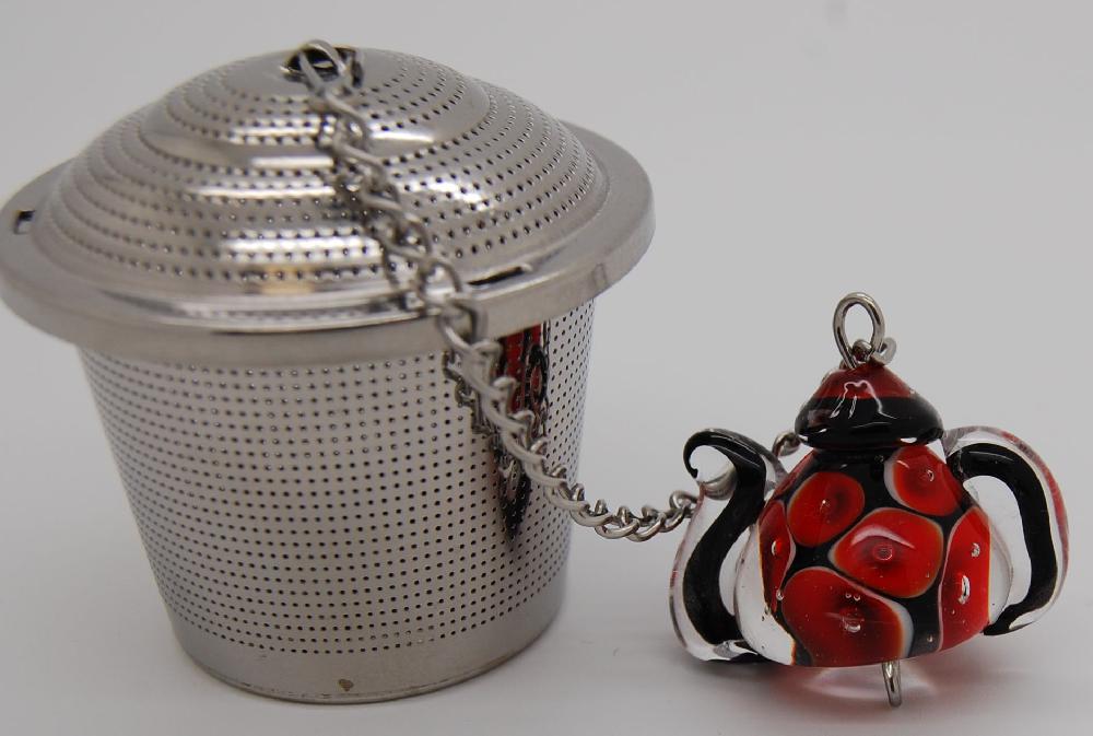 Tea infuser, teapot,  dots and bubbles red on black

