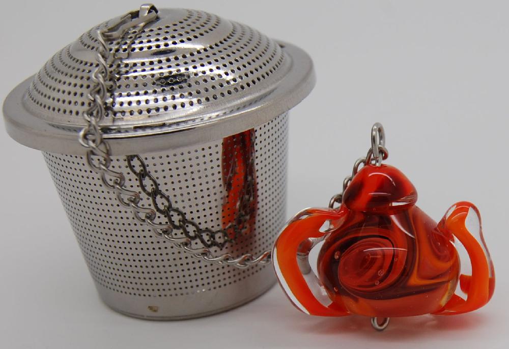 Tea infuser, teapot,  red and orange swirls
