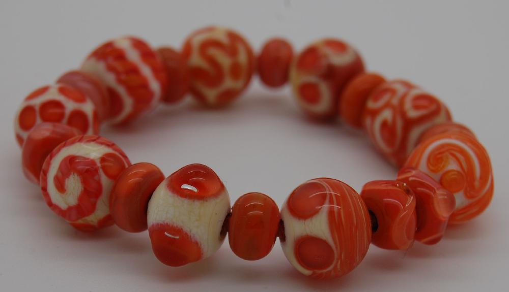 Bracelet: colour coral on ivory