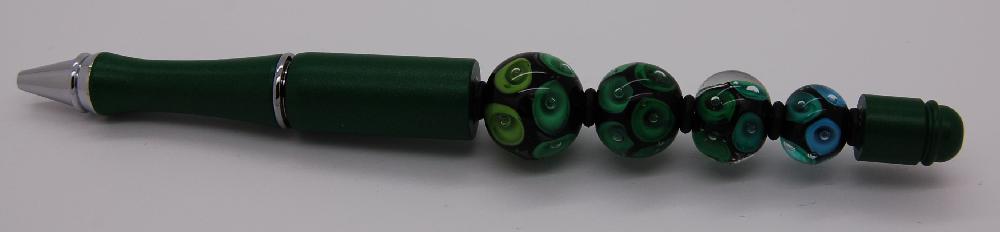 Green pen, green and turquoise beads